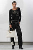 Pantaloni con polsini