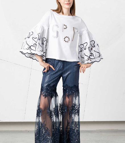 Pantalone con inserti di pizzo