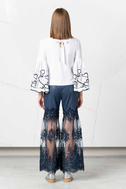 Pantalone con inserti di pizzo
