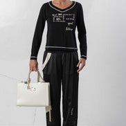 Pantaloni con polsini