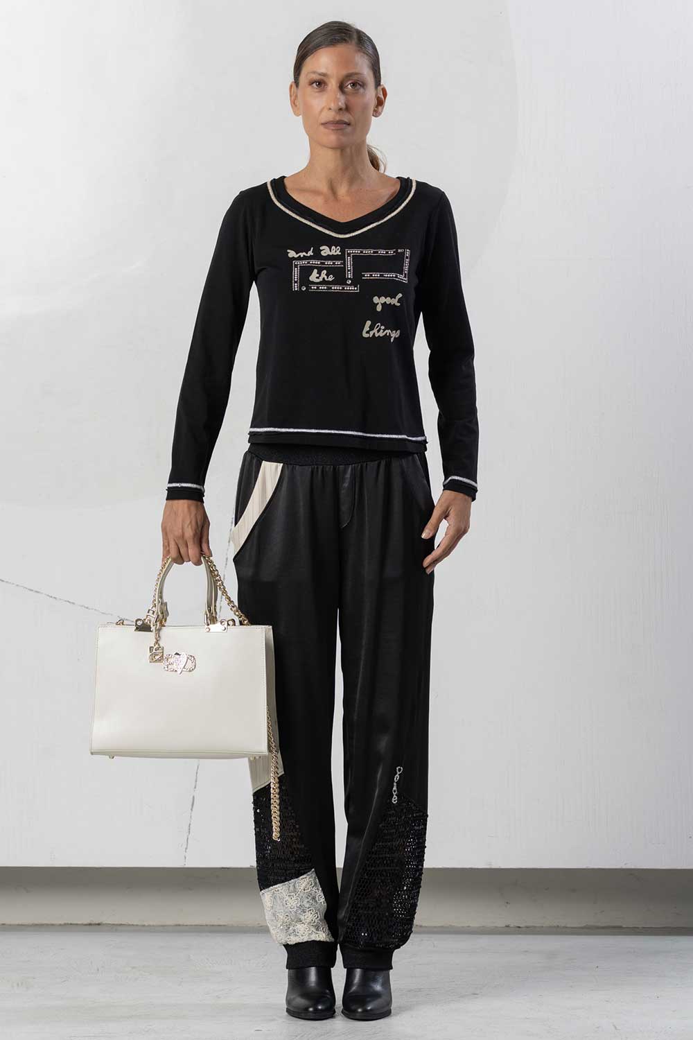 Pantaloni con polsini