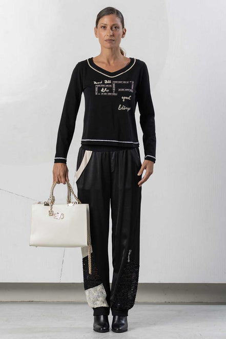 Pantaloni con polsini