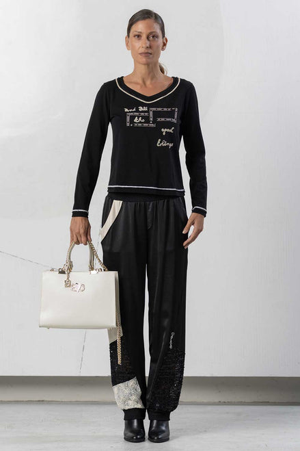 Pantaloni con polsini