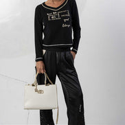 Pantaloni con polsini