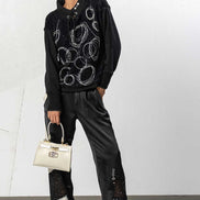 Pantaloni con polsini