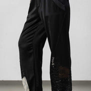 Pantaloni con polsini