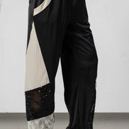 Pantaloni con polsini