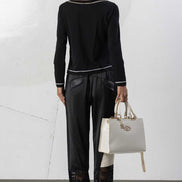 Pantaloni con polsini