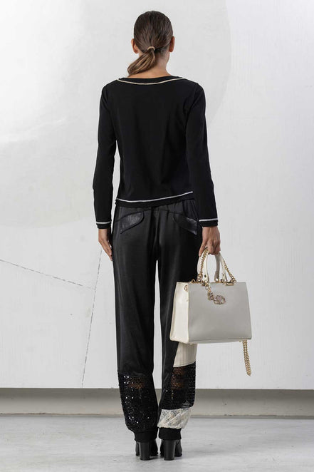 Pantaloni con polsini