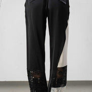 Pantaloni con polsini